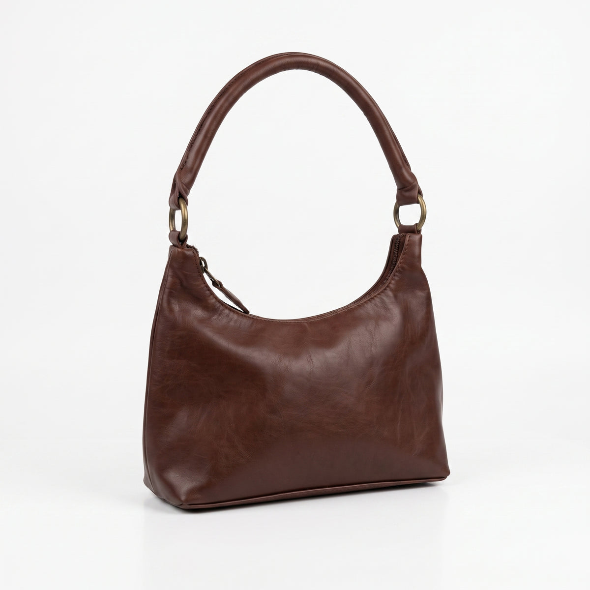 Brut & Beau brown genuine leather hobo handbag displayed on white background