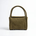 Front view of olive green leather handbag with rounded top handles